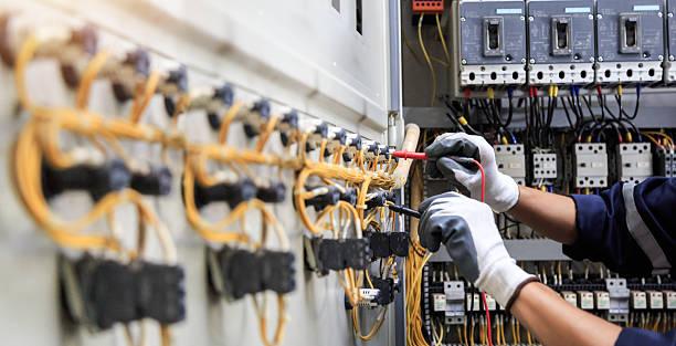 Professional Electrician technician working in College Station, TX